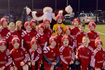 Santa comes down to Chimney Corner...as club teams up with Tiny House Coffee to raise &pound;500 for charity on Christmas Day!