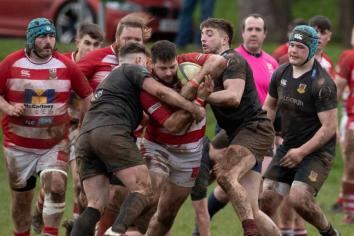 Storm decimates sport - but rugby goes on!