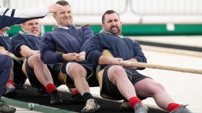 Tug of War athletes go on the pull at the Jim Baker Stadium