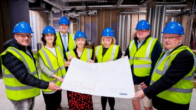 Antrim reps get a tour around new 'workspace hub' on High Street.