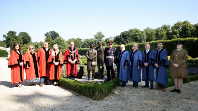 Late Queen 'reunited' with Prince Philip as new statue is unveiled in the Castle Gardens
