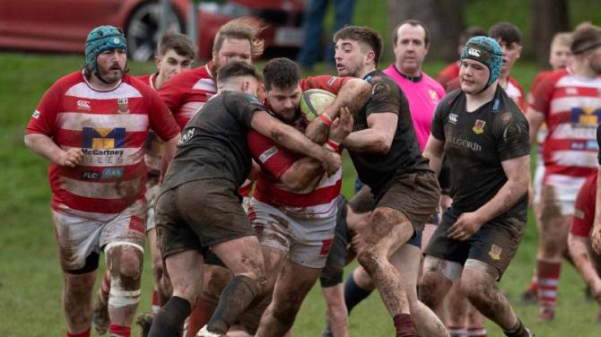 Storm decimates sport - but rugby goes on!